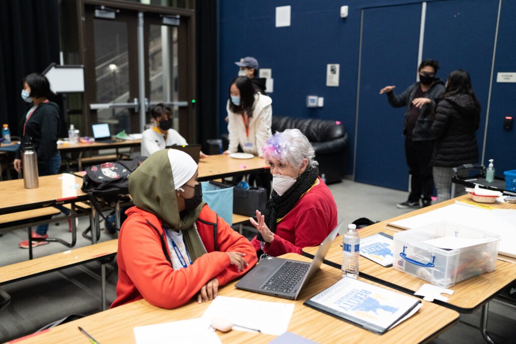 Volunteer tutoring a student