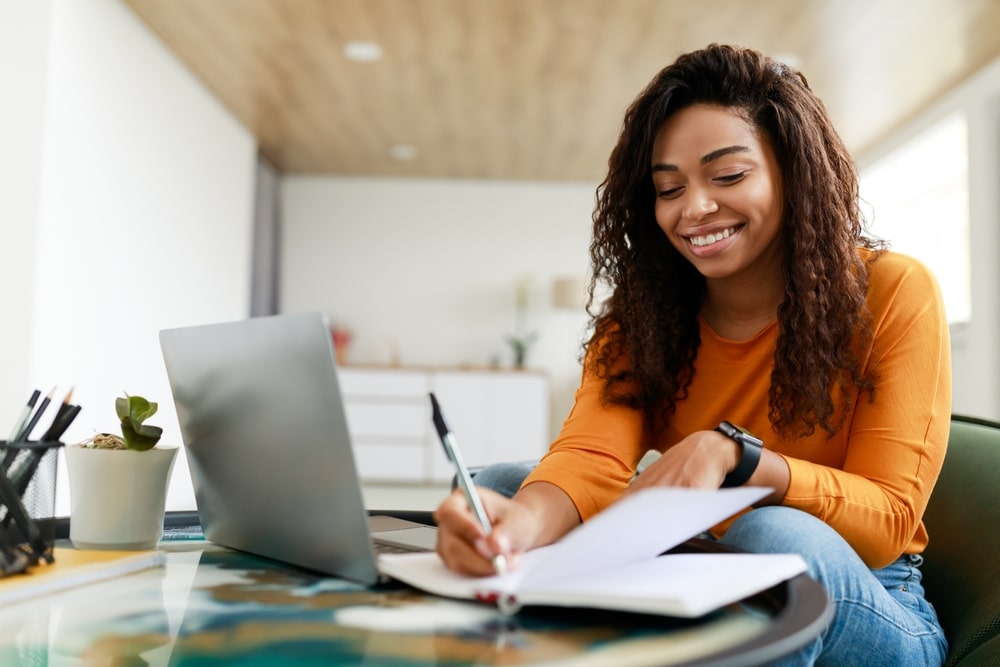 Business,And,Education,Concept.,Smiling,Young,Black,Woman,Sitting,At